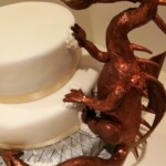 Stacked Almond Wedding cake with bespoke chocolate dragon