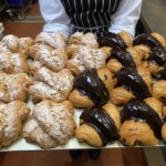 Chocolate praline filling with a chocolate glaze, or rolled almond filling with crunchy flaked toasted almonds.